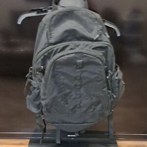 Black Tactical Backpack with Adjustable Straps and Durable Material